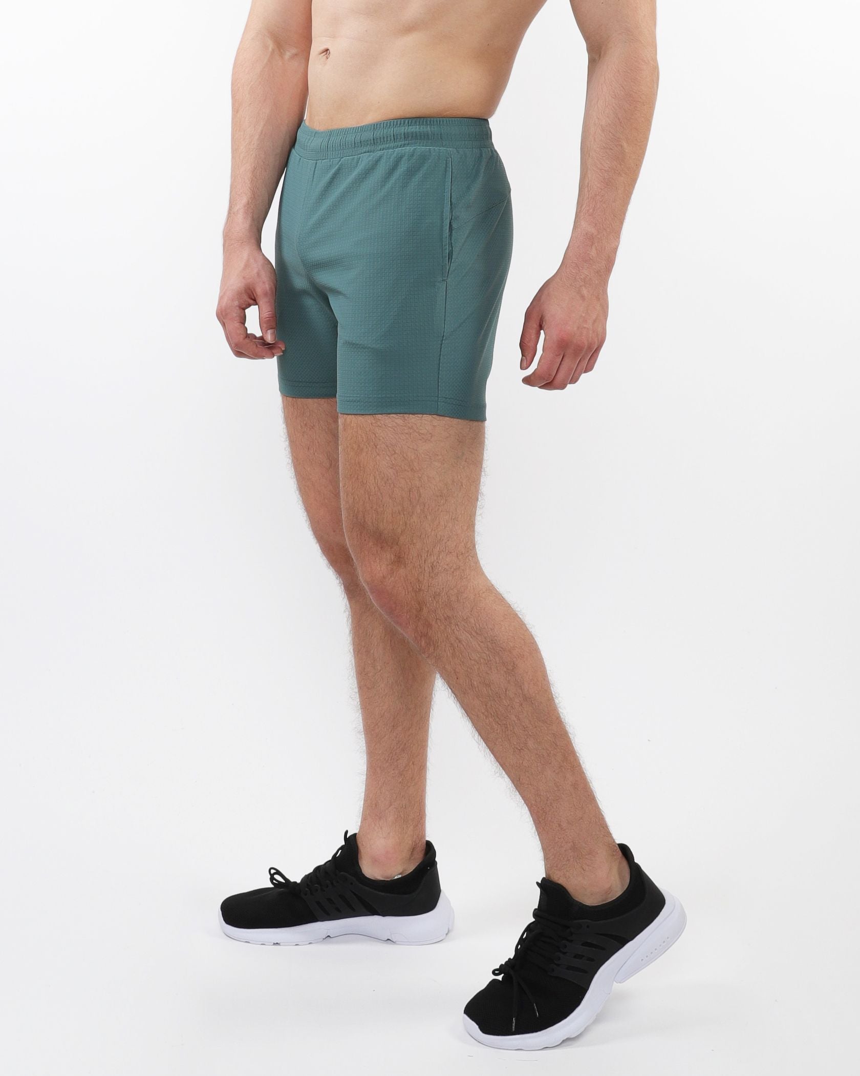 TEXTURED MESH STRETCH PERFORMANCE SHORTS